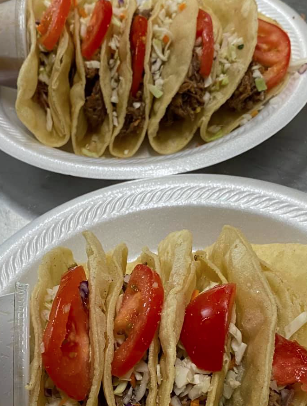 Two plates of tacos from Tortilleria La Autentica