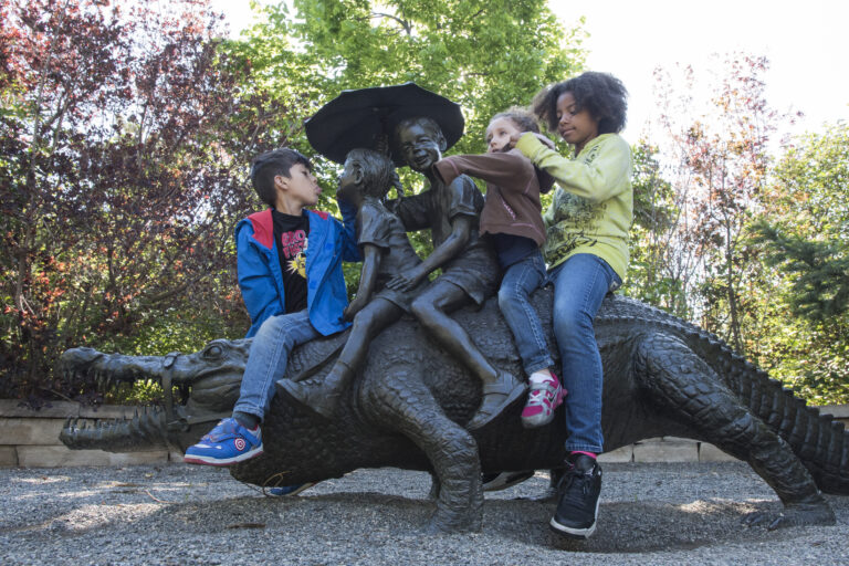 Children playing on a sculpture in Benson Sculpture Garden