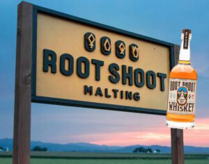 Root Shoot Malting sign and whiskey bottle