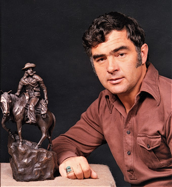 George Walbye poses with his sculpture "Today's Journey" in 1972