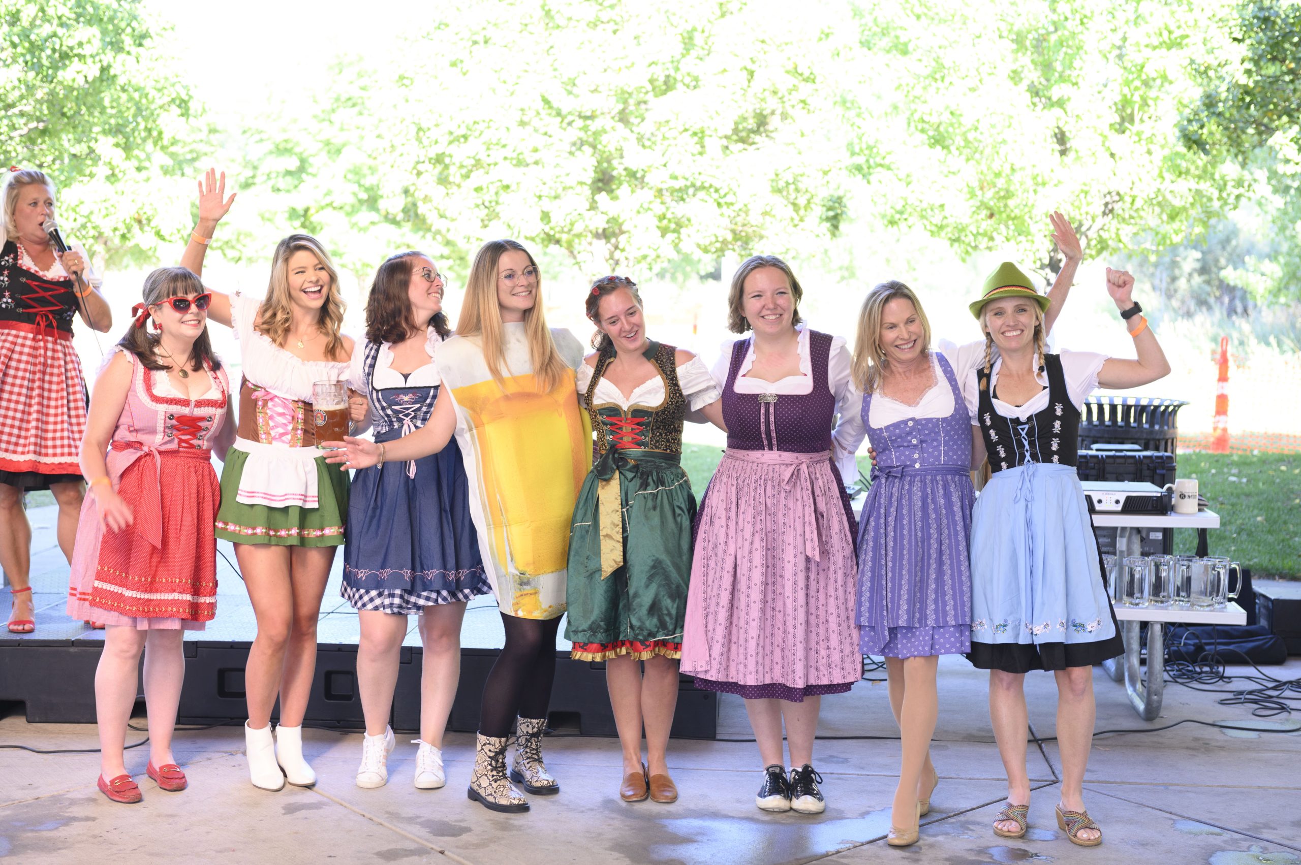 Participants of Loveland Oktoberfest post for a picture at Fairgrounds Park