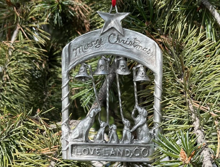 2024 Loveland Winter Holiday Council Christmas Ornament hanging in a Christmas Tree