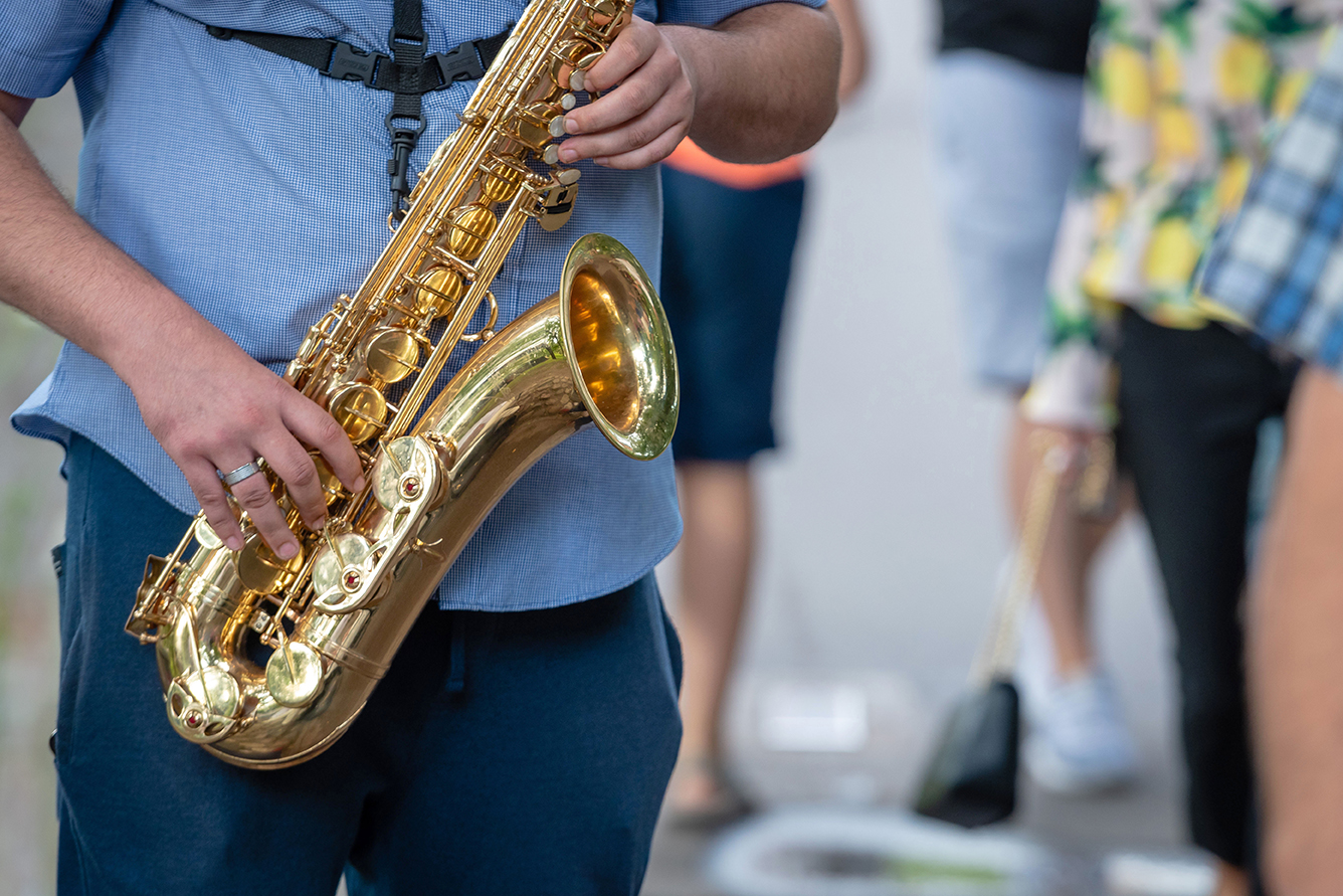 Person playing a saxaphone