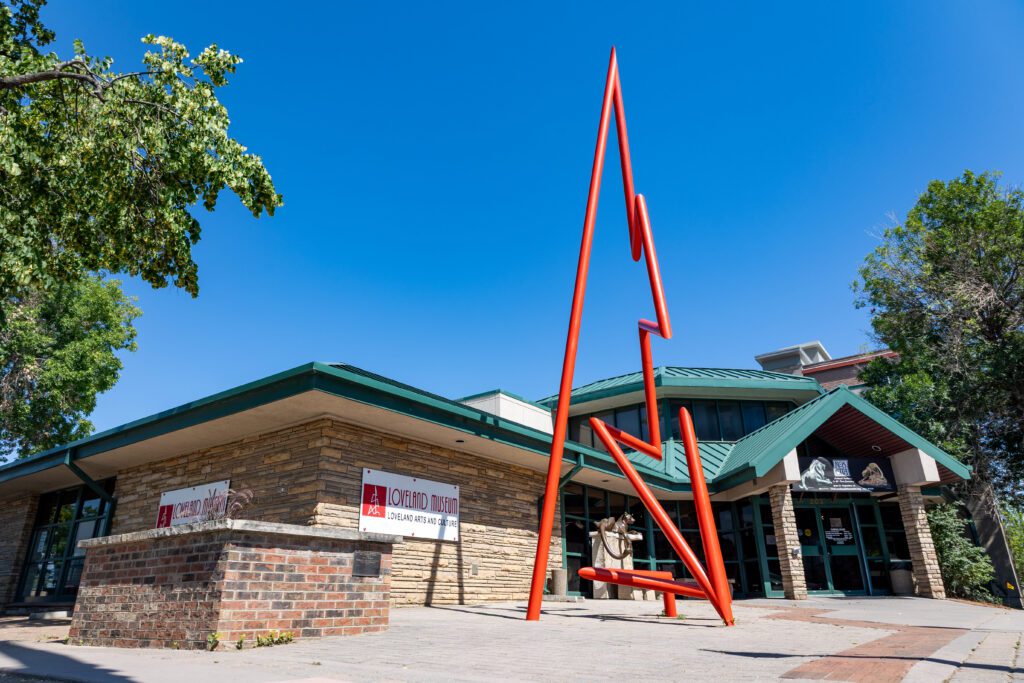 The exterior of the Loveland Museum on a blue sky sunny summer day.