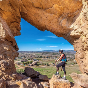 A hiker standing in the keyhole at Devil's Backbone Trail Loveland CO