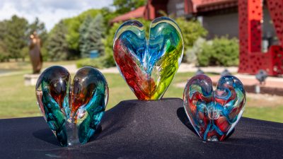 Glass hearts on display outside the Loveland Visitors Center